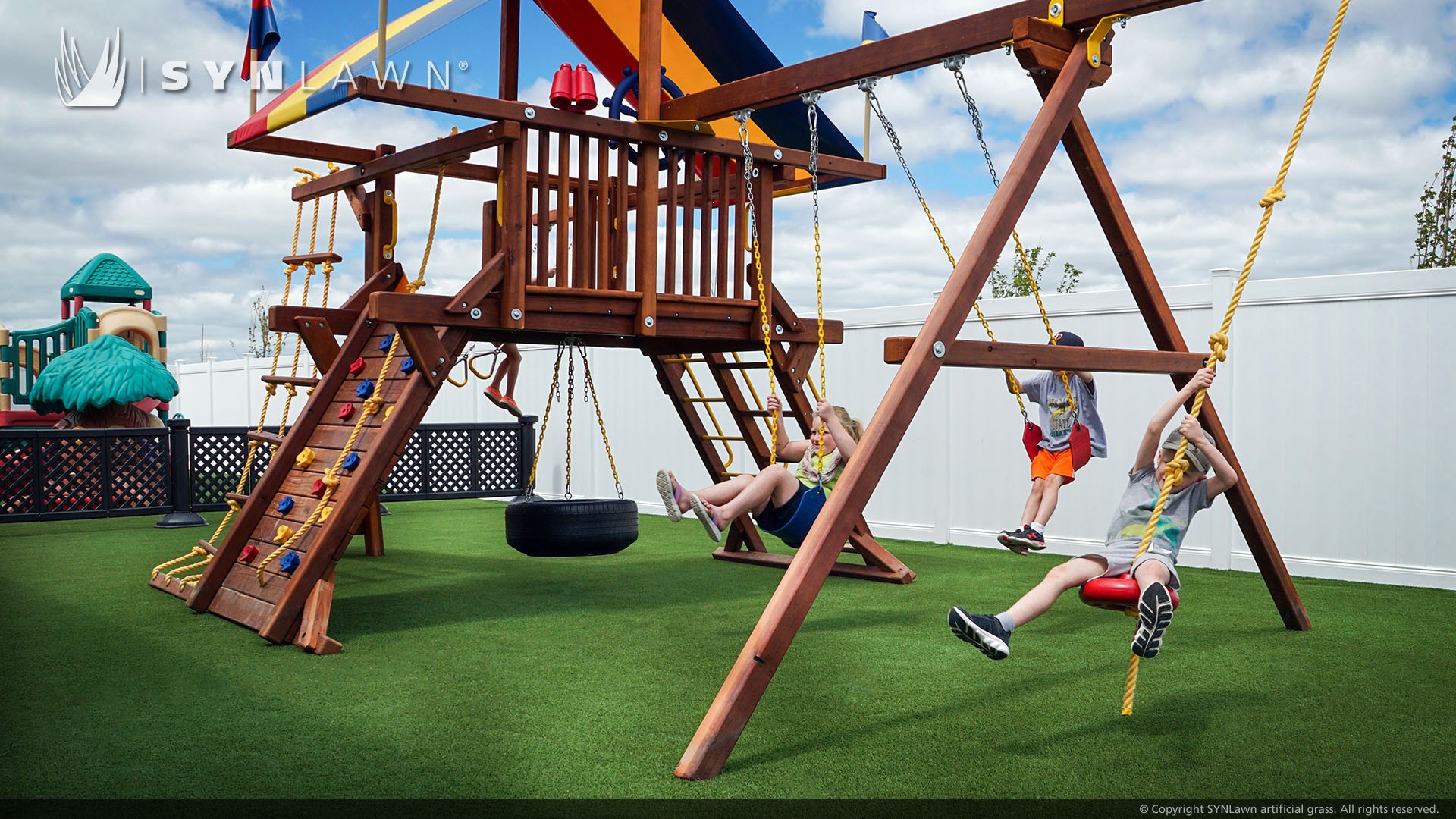 Get Less Skinned Knees and Softer Landings with Artificial Grass in Your Outdoor Play Areas